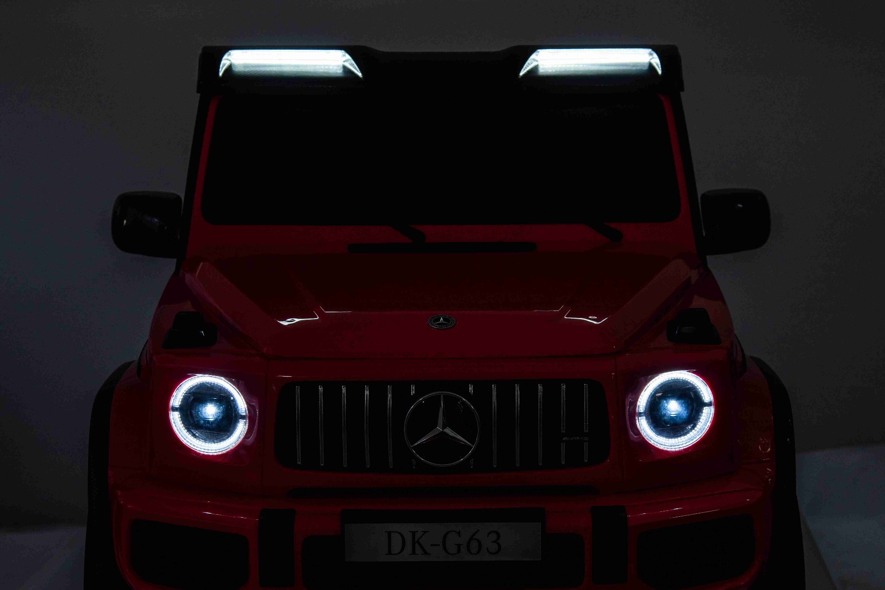 Mașină electrică Mercedes-Benz G63 AMG 4x4 cu două locuri 12V, roșu, MP3 Player cu intrare USB/AUX, tracțiune 4x4, baterie 12V14Ah, roți EVA cu suspensie, scaune din piele, telecomandă, licențiat - imagine 27