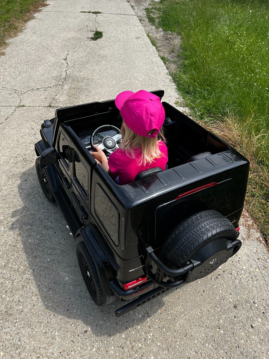 Mașină electrică Mercedes-Benz G63 AMG 4x4 cu două locuri 12V, roșu, MP3 Player cu intrare USB/AUX, tracțiune 4x4, baterie 12V14Ah, roți EVA cu suspensie, scaune din piele, telecomandă, licențiat - imagine 30