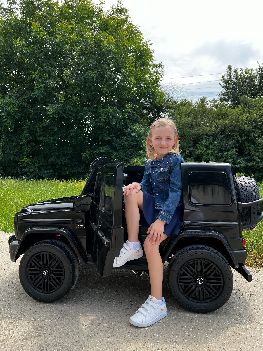 Mașină electrică Mercedes-Benz G63 AMG 4x4 cu două locuri 12V, negru, MP3 Player cu intrare USB/AUX, tracțiune 4x4, baterie 12V14Ah, roți EVA cu suspensie, scaune din piele, telecomandă, licențiat - imagine 24