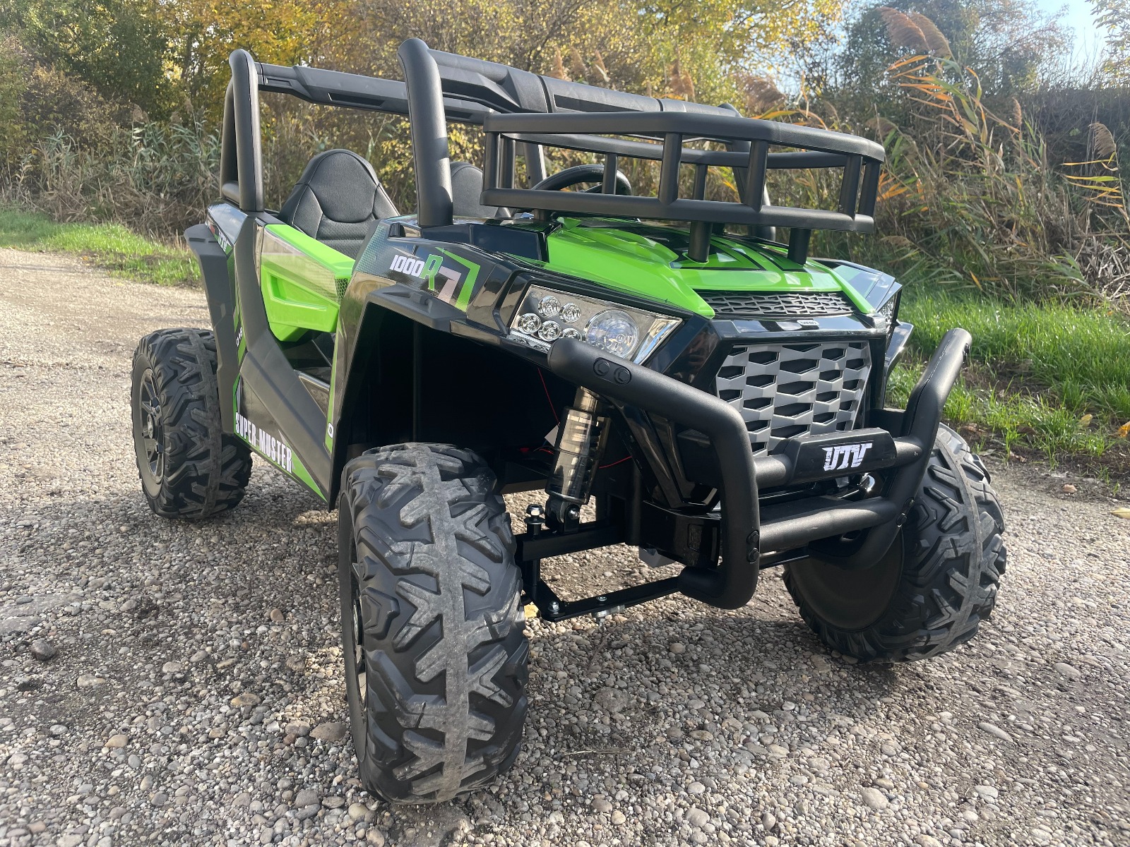 Mașină electrică pentru copii UTV 24V, verde, două locuri, motor 2 x 200 W, Baterie litiu, roți EVA, osii cu arcuri, frână electrică, scaun tapițat, 2.4 GHz DO, două locuri, USB, AUX - imagine 9